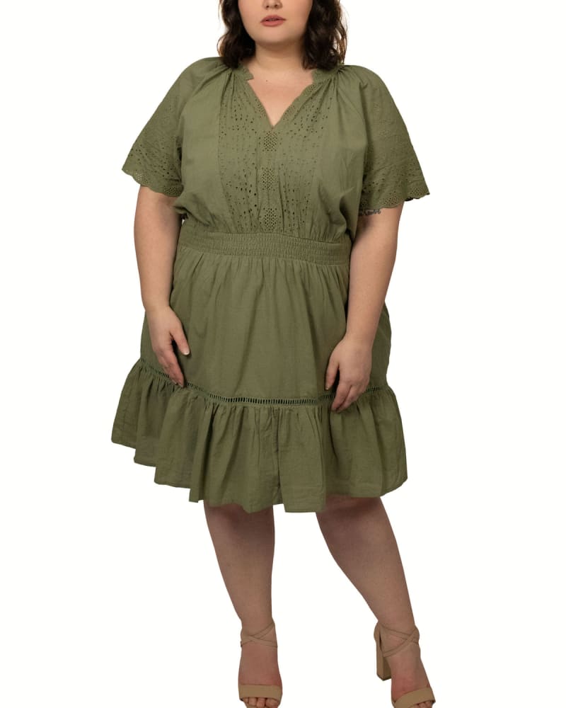 Front of a model wearing a size 1X Isabella Dress Tiered Eyelet V-Neck Sage Green in Sage Green by ANNICK. | dia_product_style_image_id:290475
